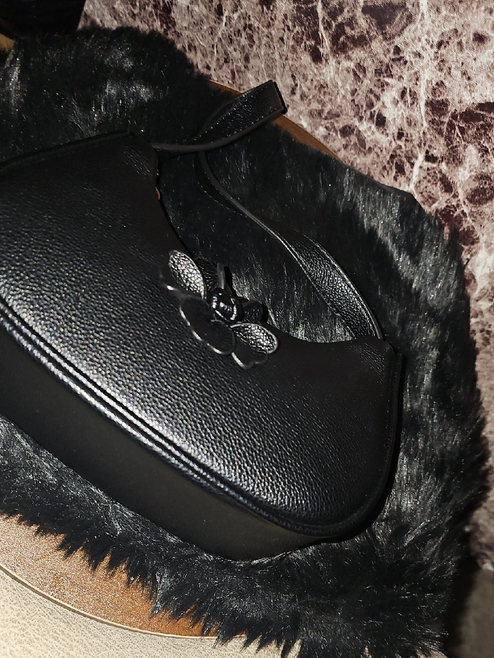 Black Leather Shoulder Bag with Floral Accent